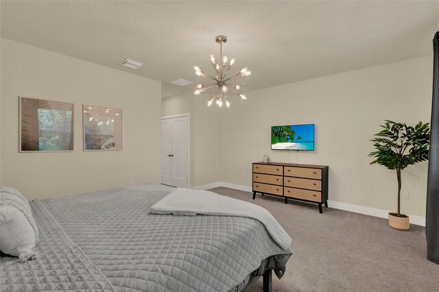 17441 Hidden Forest Dr, Clermont, FL 34714 - bedroom with a chandelier, carpet, and baseboards