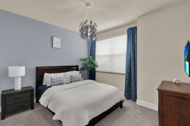 17441 Hidden Forest Dr, Clermont, FL 34714 - bedroom featuring light carpet and baseboards
