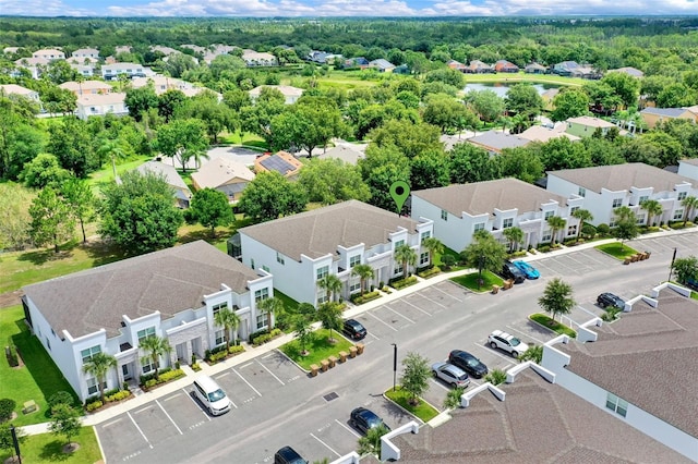 17441 Hidden Forest Dr, Clermont, FL 34714 - aerial view of residential area with a nearby body of water