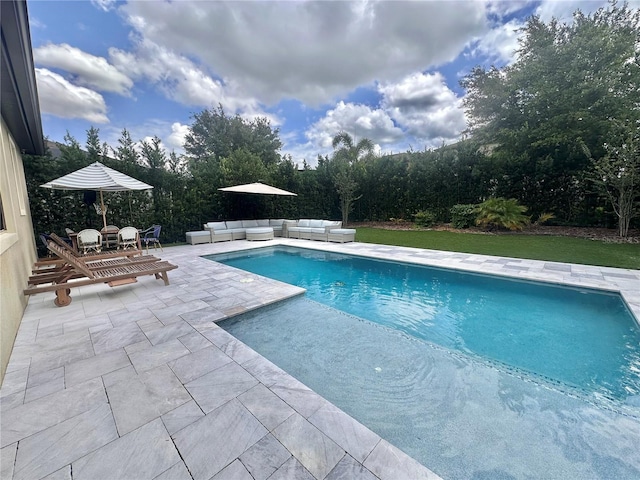 14117 Larkspur Lake Dr, Winter Garden, FL 34787 - swimming pool with an outdoor living space and a patio