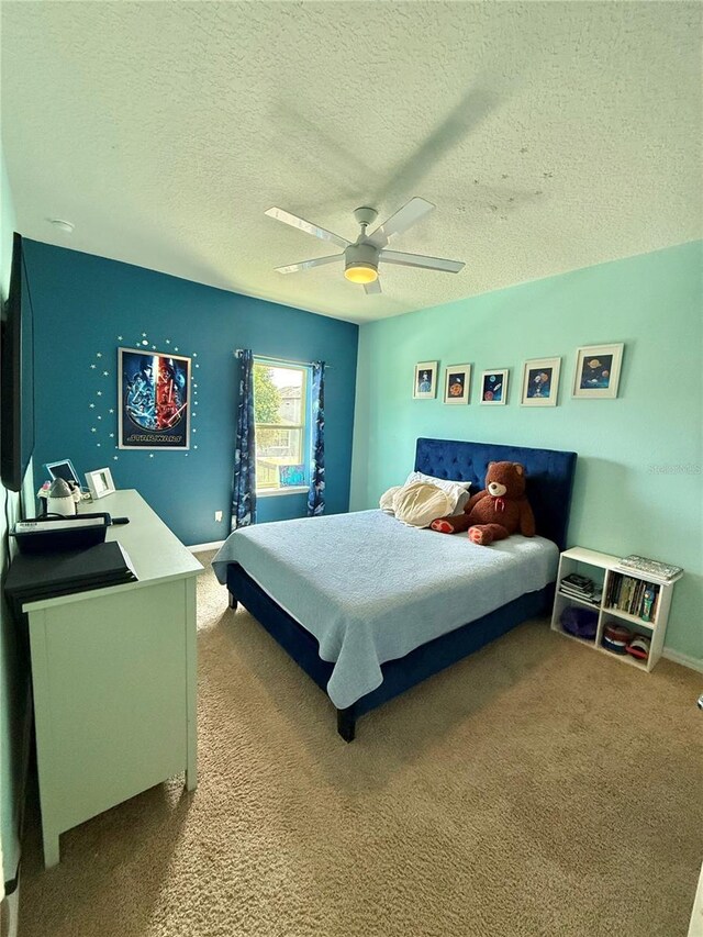 14117 Larkspur Lake Dr, Winter Garden, FL 34787 - bedroom with carpet floors, a textured ceiling, and ceiling fan