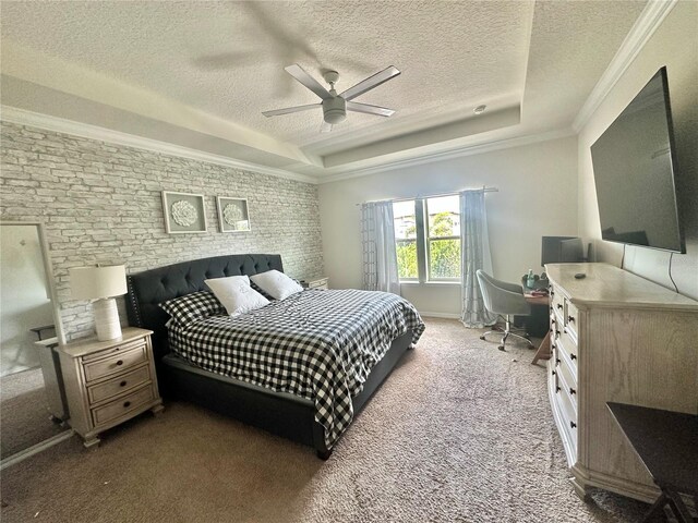 14117 Larkspur Lake Dr, Winter Garden, FL 34787 - bedroom featuring a tray ceiling, a textured ceiling, carpet, crown molding, and a desk