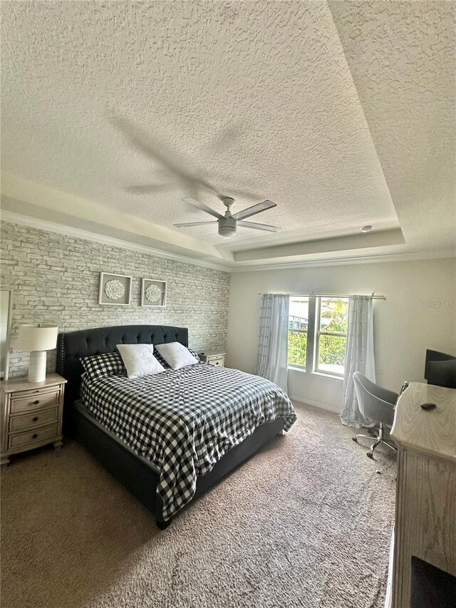 14117 Larkspur Lake Dr, Winter Garden, FL 34787 - bedroom featuring a textured ceiling, carpet floors, a ceiling fan, and a tray ceiling