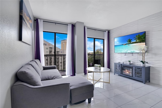 6165 Carrier Dr Unit 2605, Orlando, FL 32819 - living room with healthy amount of natural light