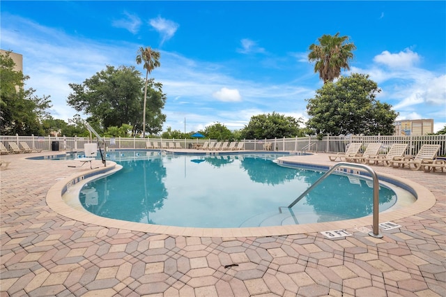 6165 Carrier Dr Unit 2605, Orlando, FL 32819 - community pool with a patio