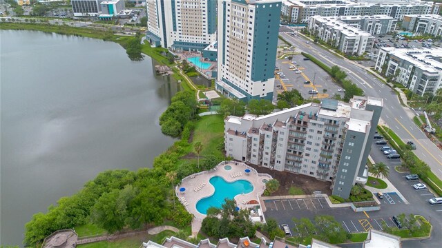 6165 Carrier Dr Unit 2605, Orlando, FL 32819 - view of urban area with a pool and a large body of water