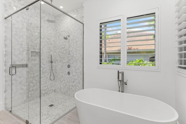 5199 Latrobe Dr, Windermere, FL 34786 - full bathroom with a stall shower and a soaking tub