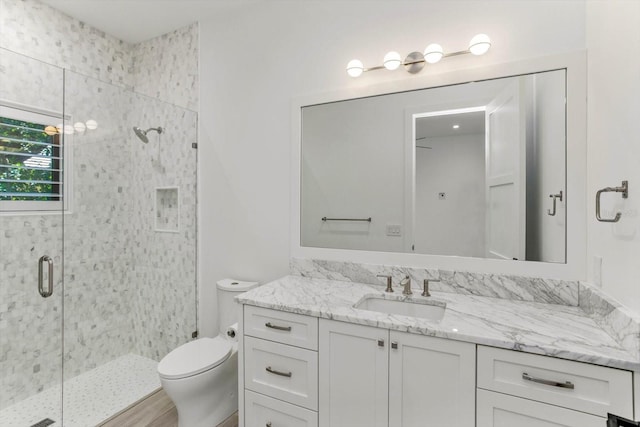 5199 Latrobe Dr, Windermere, FL 34786 - bathroom with vanity, a shower stall, and toilet