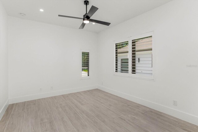 5199 Latrobe Dr, Windermere, FL 34786 - unfurnished room featuring light wood-type flooring, baseboards, a ceiling fan, recessed lighting, and a smoke detector