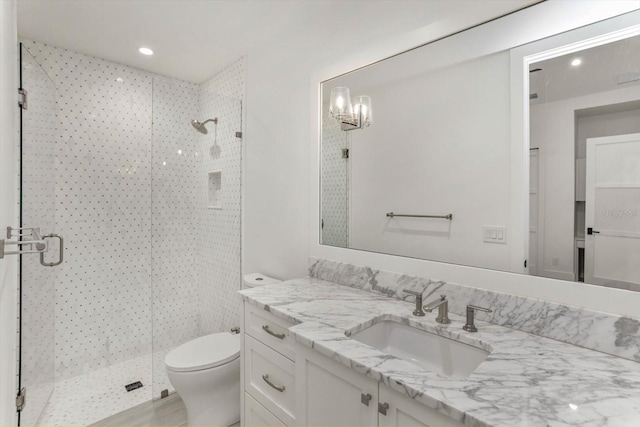 5199 Latrobe Dr, Windermere, FL 34786 - bathroom with a stall shower, vanity, toilet, and recessed lighting