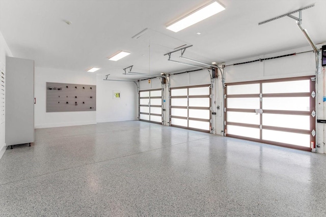 5199 Latrobe Dr, Windermere, FL 34786 - garage with baseboards