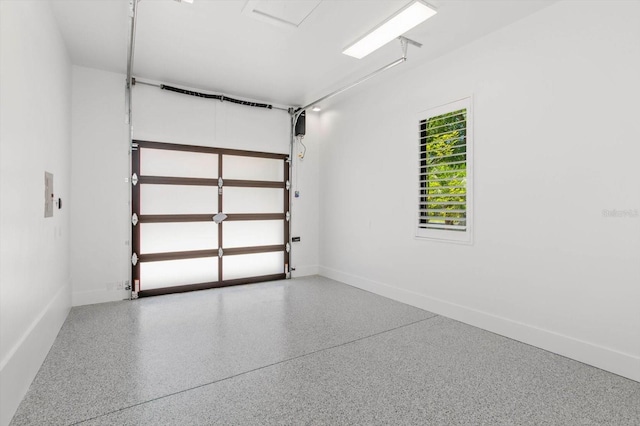 5199 Latrobe Dr, Windermere, FL 34786 - garage featuring baseboards