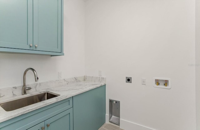 5199 Latrobe Dr, Windermere, FL 34786 - laundry area with electric dryer hookup, cabinet space, hookup for a washing machine, and wood finished floors