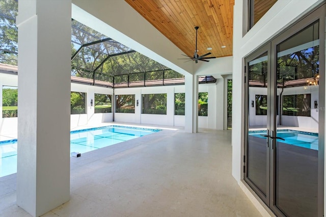 5199 Latrobe Dr, Windermere, FL 34786 - swimming pool with a patio area, french doors, a ceiling fan, and glass enclosure