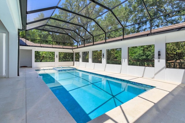 5199 Latrobe Dr, Windermere, FL 34786 - view of pool with a patio area, a pool with connected hot tub, and glass enclosure