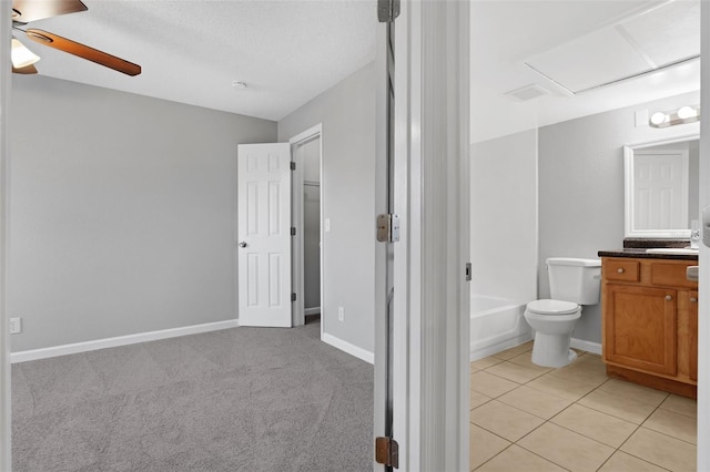 351 Lone Hill Dr Unit 206, Altamonte Springs, FL 32701 - bathroom with vanity, ceiling fan, toilet, tile patterned flooring, and baseboards