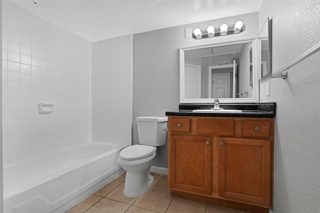351 Lone Hill Dr Unit 206, Altamonte Springs, FL 32701 - bathroom featuring tile patterned flooring, vanity, toilet, a textured wall, and shower / tub combination
