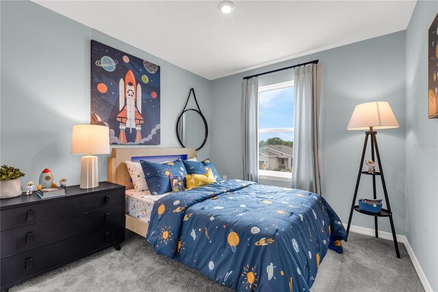 3345 Thicket St, Tavares, FL 32778 - carpeted bedroom featuring baseboards