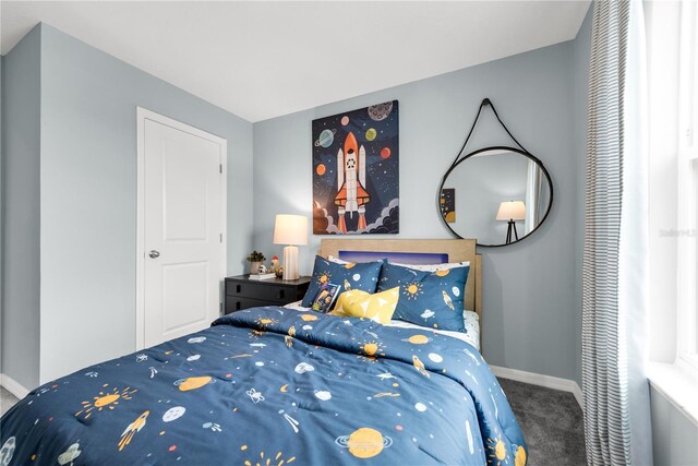 3345 Thicket St, Tavares, FL 32778 - carpeted bedroom with baseboards