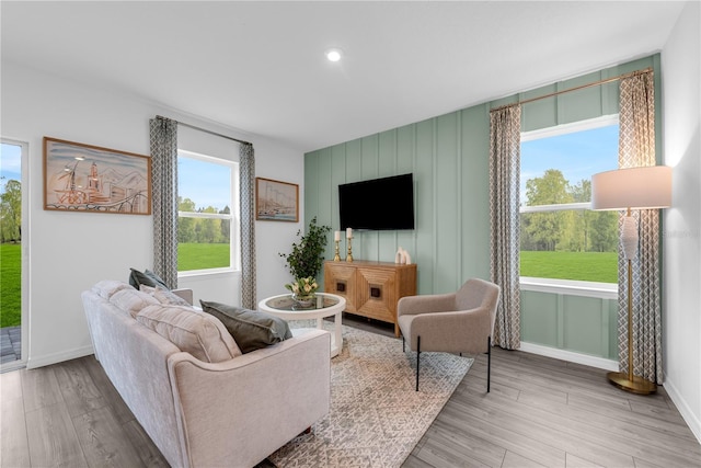 3345 Thicket St, Tavares, FL 32778 - living room with baseboards, wood finished floors, and recessed lighting