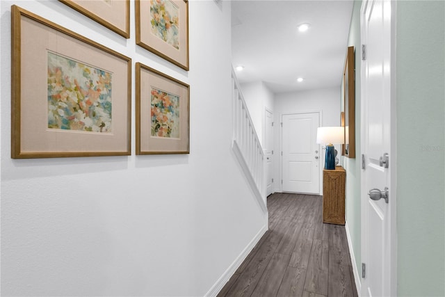 3345 Thicket St, Tavares, FL 32778 - corridor with baseboards, dark wood finished floors, recessed lighting, and stairway