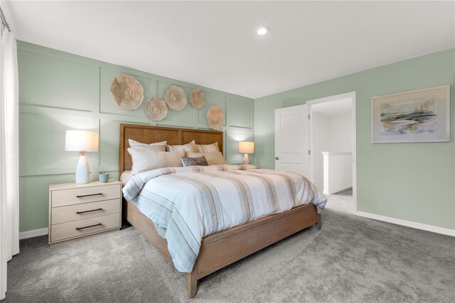 3345 Thicket St, Tavares, FL 32778 - carpeted bedroom featuring baseboards