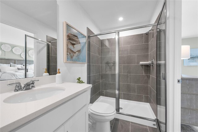 3345 Thicket St, Tavares, FL 32778 - ensuite bathroom featuring vanity, a shower stall, toilet, and tile patterned flooring