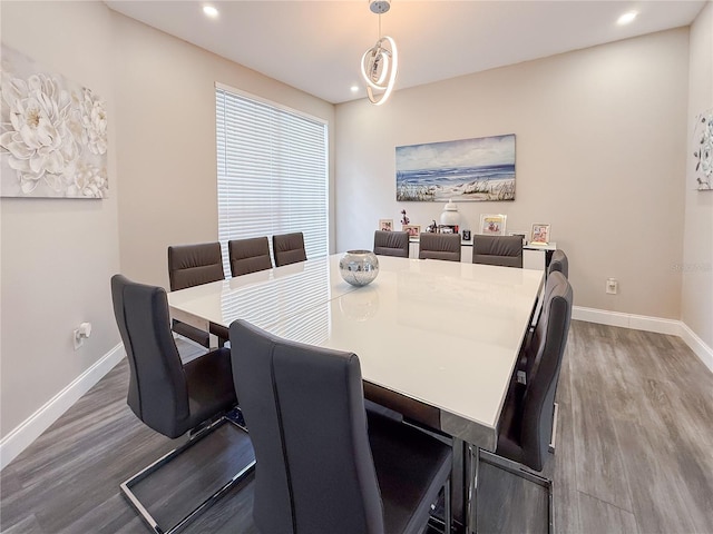224 Hammock Dunes Pl, Orlando, FL 32828 - dining space with wood finished floors, baseboards, and recessed lighting