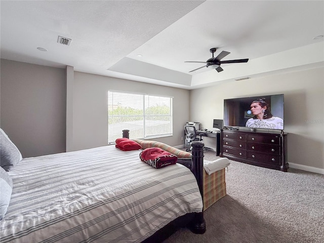 224 Hammock Dunes Pl, Orlando, FL 32828 - carpeted bedroom with ceiling fan, a raised ceiling, and baseboards