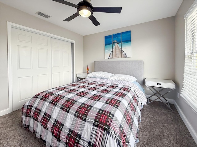224 Hammock Dunes Pl, Orlando, FL 32828 - carpeted bedroom featuring a closet, baseboards, and ceiling fan