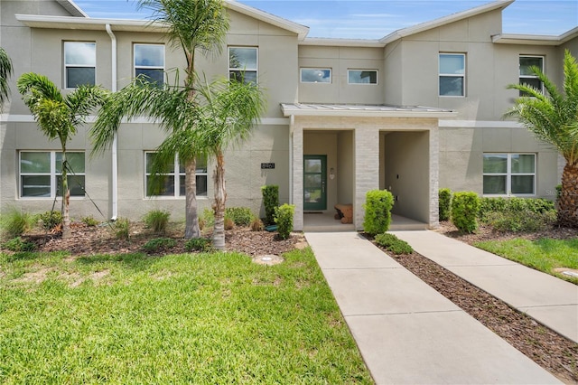 8961 Cabot Cliffs Dr, Davenport, FL 33896 - multi unit property featuring stucco siding and a front yard