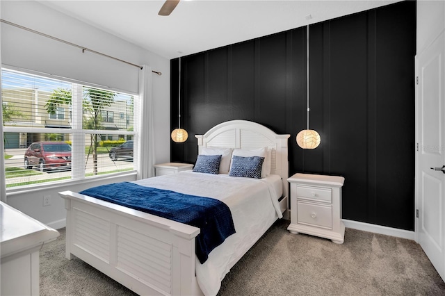 8961 Cabot Cliffs Dr, Davenport, FL 33896 - bedroom with light carpet, baseboards, and a ceiling fan