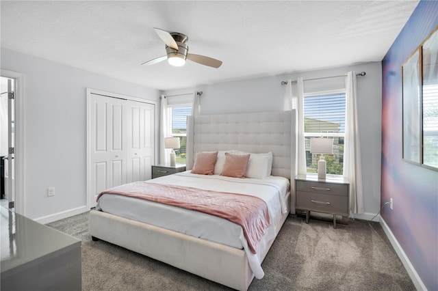 8961 Cabot Cliffs Dr, Davenport, FL 33896 - carpeted bedroom featuring a closet, baseboards, and ceiling fan