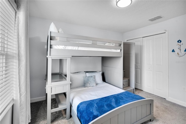 8961 Cabot Cliffs Dr, Davenport, FL 33896 - bedroom with carpet floors, baseboards, and a closet