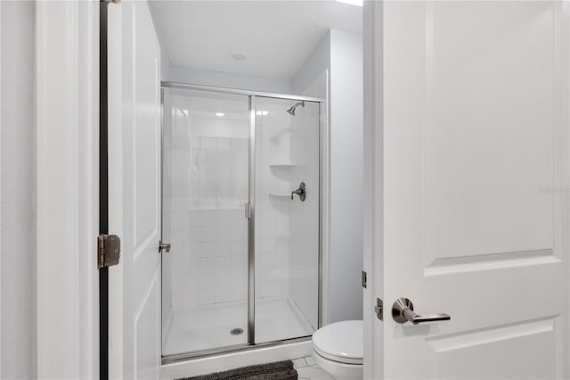 8961 Cabot Cliffs Dr, Davenport, FL 33896 - bathroom with a stall shower and toilet