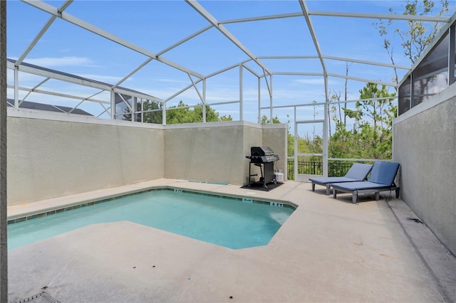 8961 Cabot Cliffs Dr, Davenport, FL 33896 - view of pool with area for grilling, a patio, and a lanai