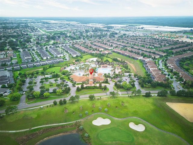 8961 Cabot Cliffs Dr, Davenport, FL 33896 - aerial view of property and surrounding area featuring a local golf course, nearby suburban area, and a large body of water