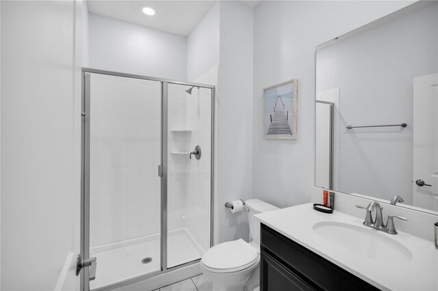 8961 Cabot Cliffs Dr, Davenport, FL 33896 - bathroom with toilet, vanity, a stall shower, and marble look tiles
