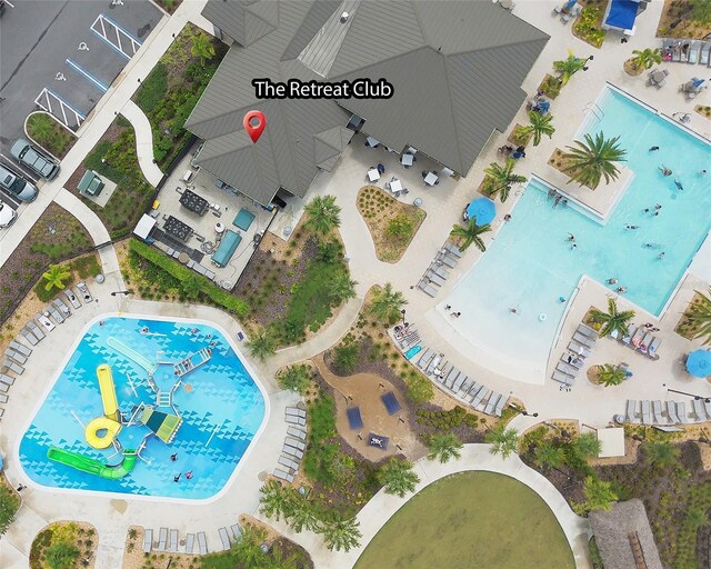 8961 Cabot Cliffs Dr, Davenport, FL 33896 - drone / aerial view of a pool