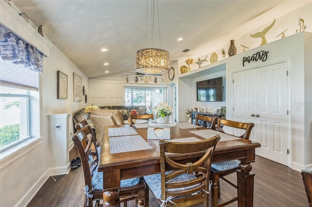 6935 Runner Oak Dr, Wesley Chapel, FL 33545 - dining area with dark wood-style floors, lofted ceiling, recessed lighting, and a chandelier