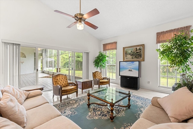 4026 S Lake Orlando Pkwy, Orlando, FL 32808 - tiled living area with high vaulted ceiling and a ceiling fan