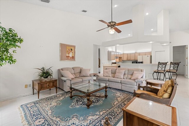 4026 S Lake Orlando Pkwy, Orlando, FL 32808 - living area with a ceiling fan, light tile patterned floors, a towering ceiling, and recessed lighting