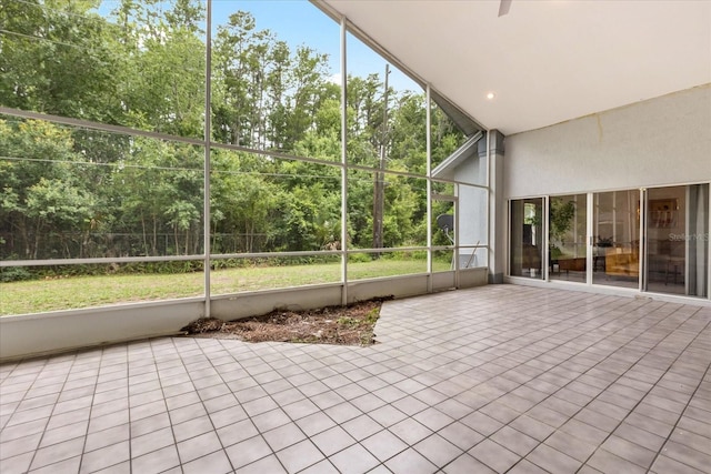 4026 S Lake Orlando Pkwy, Orlando, FL 32808 - unfurnished sunroom featuring view of scattered trees