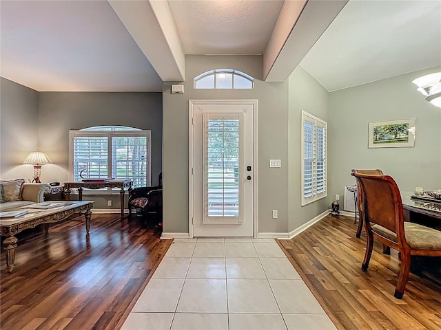 1701 Lucky Pennie Way, Apopka, FL 32712 - entrance foyer with healthy amount of natural light, light wood-type flooring, and baseboards
