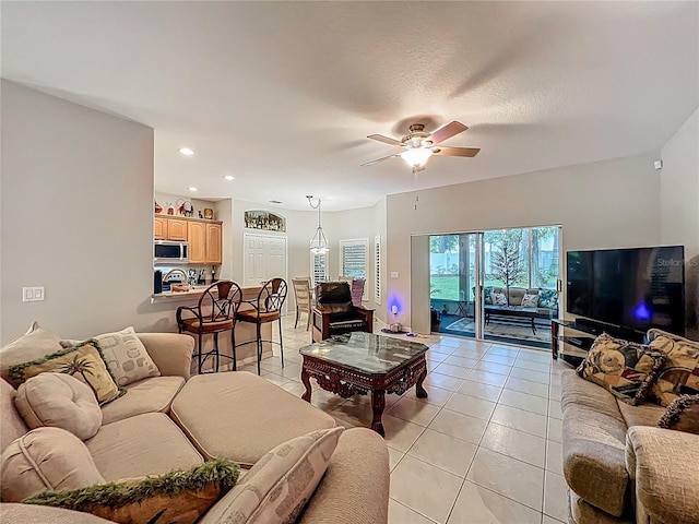 1701 Lucky Pennie Way, Apopka, FL 32712 - living area featuring light tile patterned floors, a ceiling fan, and recessed lighting