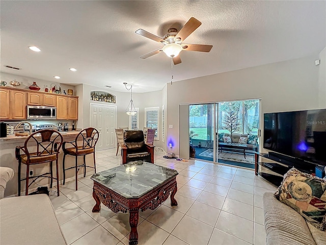 1701 Lucky Pennie Way, Apopka, FL 32712 - living room featuring light tile patterned flooring, a ceiling fan, and recessed lighting