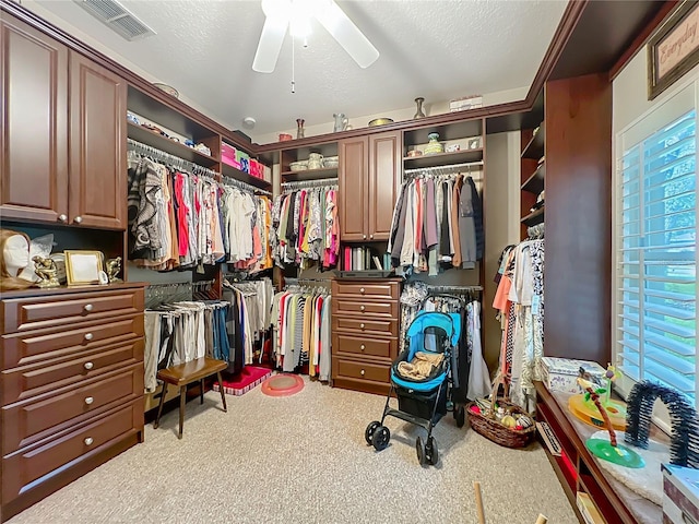 1701 Lucky Pennie Way, Apopka, FL 32712 - walk in closet with carpet and a ceiling fan