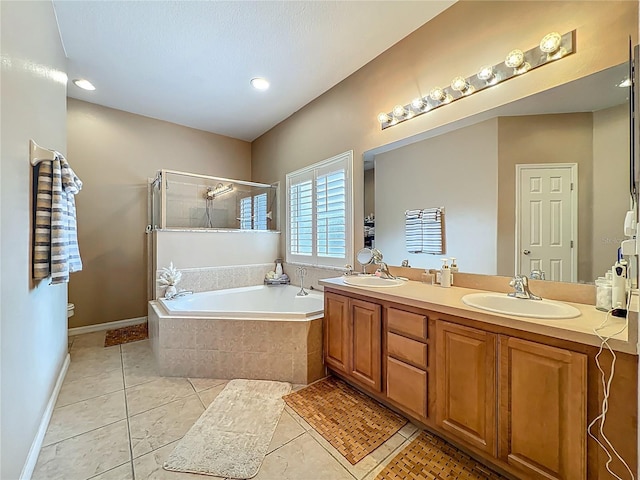 1701 Lucky Pennie Way, Apopka, FL 32712 - full bathroom with a bath, double vanity, toilet, tile patterned floors, and tiled shower