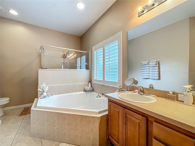 1701 Lucky Pennie Way, Apopka, FL 32712 - bathroom with a bath, toilet, vanity, tile patterned floors, and a tile shower