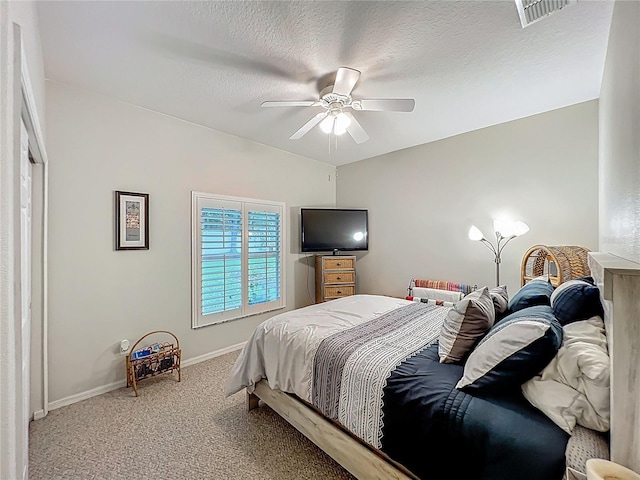 1701 Lucky Pennie Way, Apopka, FL 32712 - carpeted bedroom with baseboards, a textured ceiling, and ceiling fan